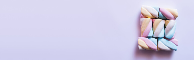 Flat lay with marshmallows on white surface with copy space, banner.