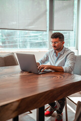 person working on his computer