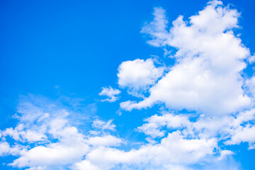 Naklejka na ściany i meble white light clouds in the blue sky