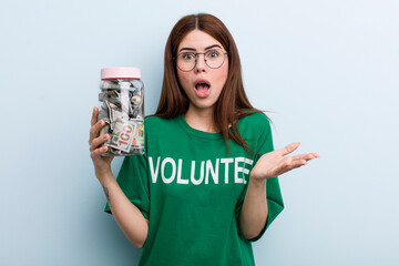 young adult pretty woman volunteer and donation concept