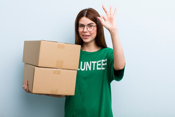 young adult pretty woman. donation and volunteer concept
