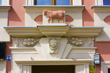 Rich decoration of doorway in old house in Old Town of Wroclaw, Poland