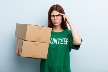 young adult pretty woman. donation and volunteer concept