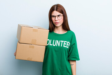young adult pretty woman. donation and volunteer concept