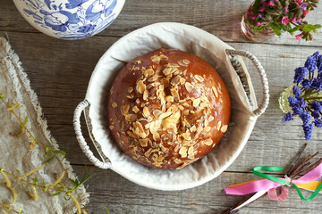Mazanec, traditional Czech sweet Easter pastry, with spring flowers and Easter eggs