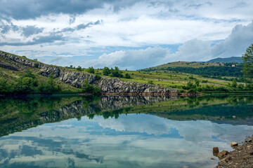 Fototapeta na wymiar Beautiful reflection on mountain lake
