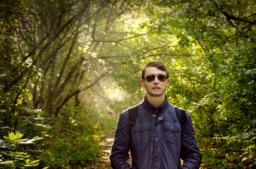 Young adult man in sunglasses