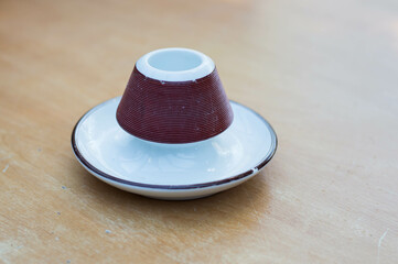 Antique porcelain match holder and lighter