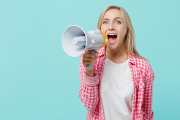 Young caucasian woman she 30s wears pink shirt white t-shirt hold scream in megaphone announces...