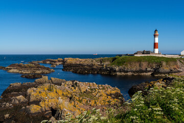 Fototapeta na wymiar view of the historic Buchan Ness Lighthouse in northern Scotland
