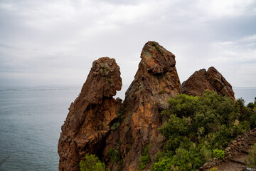 Cap Esterel in France, red rocks on the shoreline