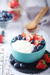 Milk rice with berries ready for breakfast