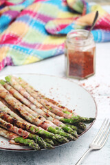 Seasonal fresh asparagus fried with bacon