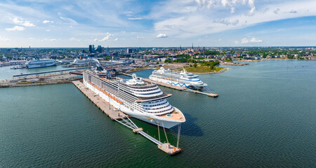 Tallinn, Estonia. June 23, 2022. Huge MSC cruise ship docked in a port in Tallinn. Beautiful aerial...