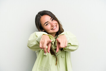 Young caucasian woman isolated on white background pointing to front with fingers.