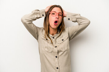 Young caucasian pregnant woman isolated on white background surprised and shocked.