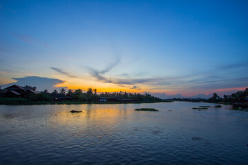 Naklejka na ściany i meble Twilight sky at Tha Chin river(Maenam Tha Chin),Nakhon Pathom,Thailand