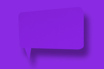 Purple paper in the shape of speech bubbles against a purple background. Communication bubbles.