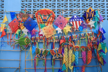 Bangkok,Thailand on March20,2021:Colorful Thai kites at Saphan Han,an important and bustling shopping district,as a part of Klong Ong Ang Walking Street.