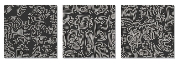 Trendy set of minimalist seamless patterns with abstract hand drawn composition