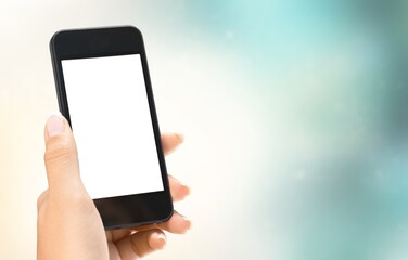 Hand holding the smartphone with blank screen