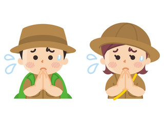 手を合わせて謝る探検隊の子供　ボーイスカウト　冒険　アウトドア