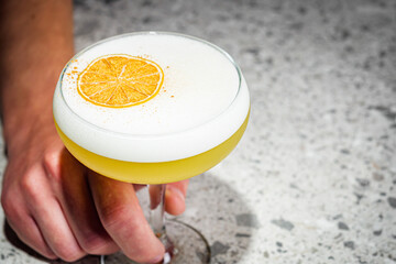 bright colored alcoholic cocktail on a bar background