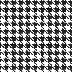 Geometric black and white seamless pattern with pied-de-poule ornament. Monochrome graphic repeating design. Modern minimalist stylish squared background. Vector chequered motif for fabric, textile
