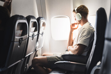 Man sitting in airplane