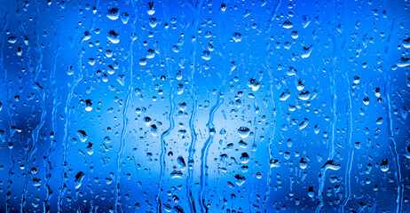 Fototapeta na wymiar Window Rain Water Drops Stormy Weather