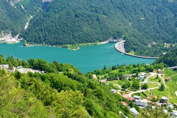 View of Lago di Cadore lake and Pieve di Cadore dam and the village of Sottocastello in Veneto...