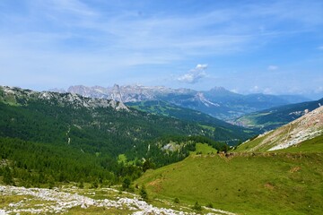 View of Puezgruppe mountain range in South Tirol region of Italy and the town of Corvara