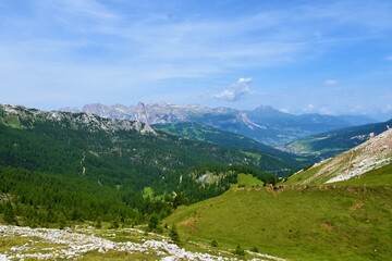 Obraz premium View of Puezgruppe mountain range in South Tirol region of Italy and the town of Corvara
