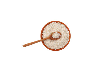 White Sago pearls or tapioca pearl in ceramic bowl on white background, top view