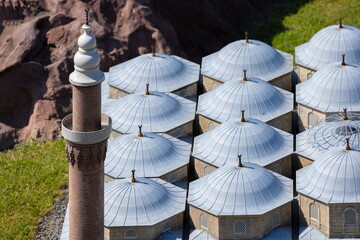 Mosque buildings and minarets, roof domes, arches and doors, elements of architectural decorations...