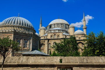 Mosque buildings and minarets, roof domes, arches and doors, elements of architectural decorations...