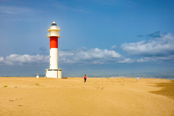 Fototapeta premium After walking about 4 km along the extensive Fangar beach, you will find the Fangar lighthouse, which is the entrance to the bay of the same name. Ebro river delta, Catalonia, Spain