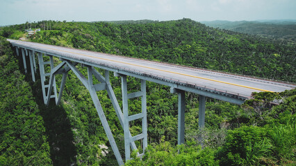 Fototapeta na wymiar Bacunayagua bridge, connecting two sides of deep canyon on the edge of Matanzas, Cuba.