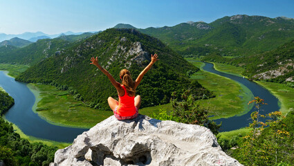 woman traveler enjoying Panoramic view of Montenegro landscape