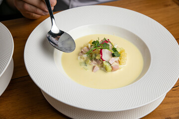 Okroshka soup. Cold soup with potatoes, radishes, yogurt
