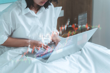 Trader at home, working on laptop with graphs and diagrams. Business woman analyzing indexes, financial chart, trading online, investment data on cryptocurrency stock market. Remote work