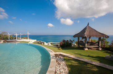 The swimming pool against a panorama of at the ocean