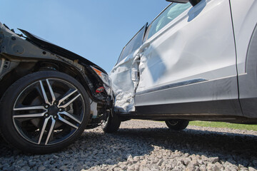 Cars crashed heavily in road accident after collision on city street. Road safety and insurance...