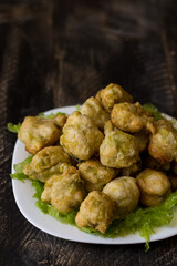 Seaweed fritters, or zeppoline, are small pieces of deep-fried grown dough typical of the Neapolitan tradition.