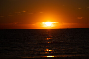 Sunset over the ocean in Cape May New Jersey at sunset beach