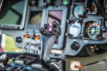 Closeup shot of helicopter joystick with a reset button