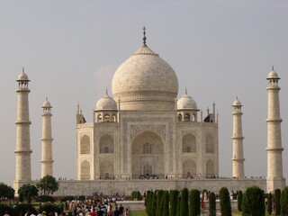 Fototapeta na wymiar Taj Mahal, Agra, India, August 18, 2011: White marble mausoleum dedicated to love. Taj Mahal