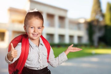 Child student ready to go to school posing