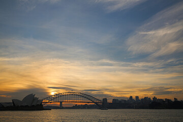 Obraz premium city harbour bridge at sunset