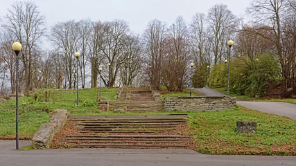 Decayed staircase and lanterns of Skoone Bastion park, Tallinn, Estonia 